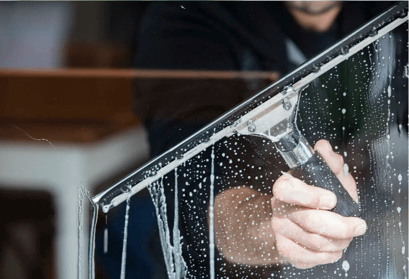 An image of a window being cleaned.